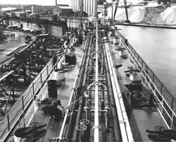 A trunk deck was added with pipes for loading the ship's liquid cargo.